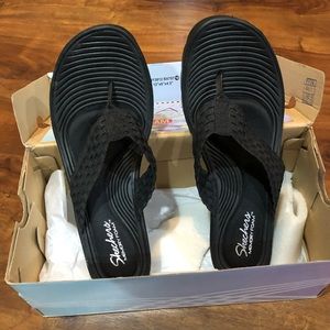 Black Skechers Stretch Weave Sandals, size 9